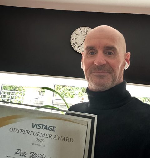 Pete Wilkinson holding his Vistage Outperformer Award, 2025